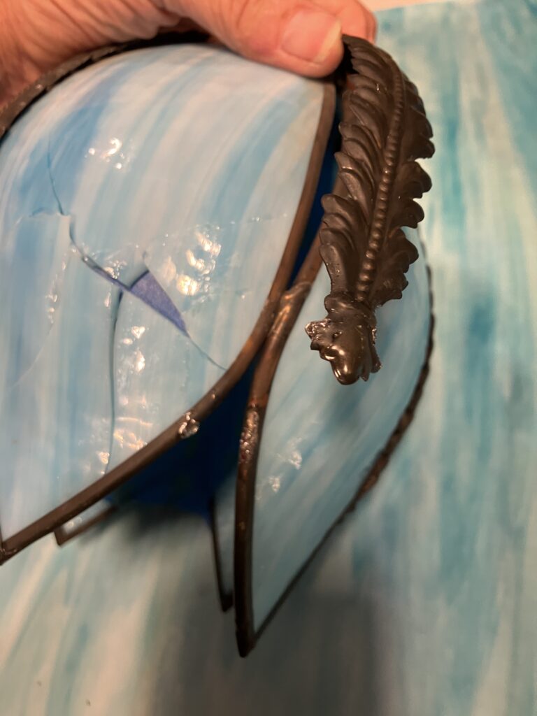 Small slag glass sconce repair.